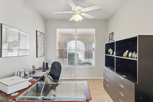 home office featuring ceiling fan and light tile patterned flooring