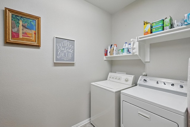 laundry area featuring washer and dryer and laundry area