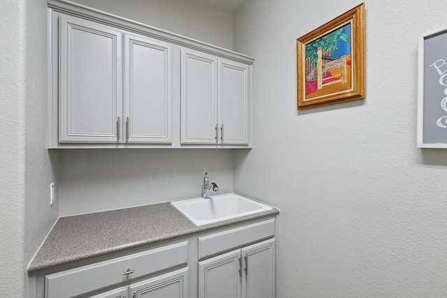 laundry area featuring a sink