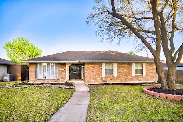 ranch-style house with brick siding, crawl space, a front yard, and fence