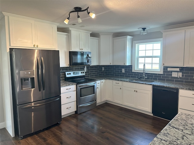 kitchen with white cabinetry, black appliances, dark wood-type flooring, and a sink