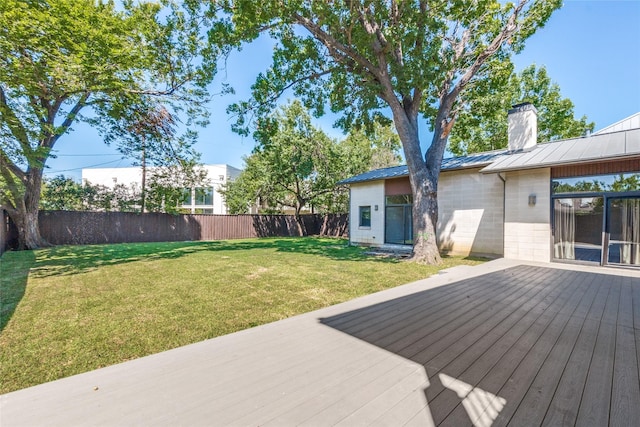 view of yard with a wooden deck and fence private yard