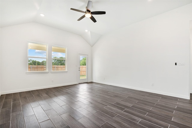 unfurnished room with wood finish floors, baseboards, lofted ceiling, and ceiling fan