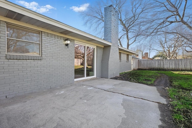 view of patio with fence