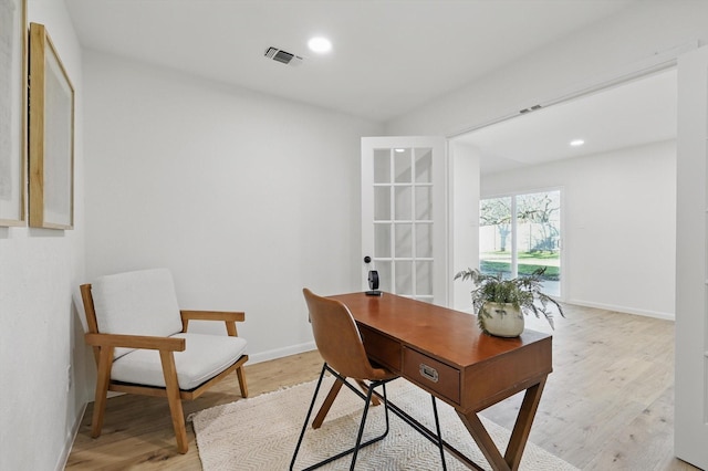 home office with light wood-style flooring, recessed lighting, baseboards, and visible vents