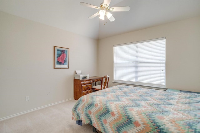 bedroom with ceiling fan, lofted ceiling, baseboards, and light carpet