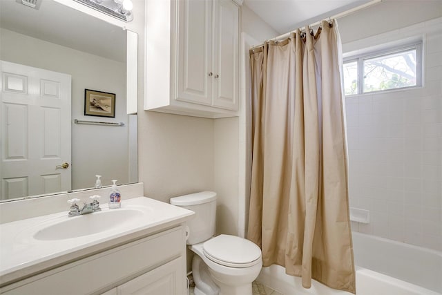 full bathroom featuring vanity, toilet, visible vents, and shower / bath combo with shower curtain