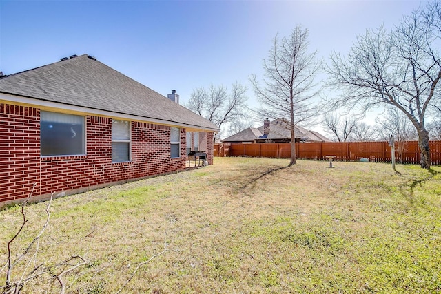 view of yard featuring fence