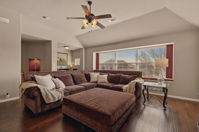 living room with vaulted ceiling, wood finished floors, visible vents, and ceiling fan