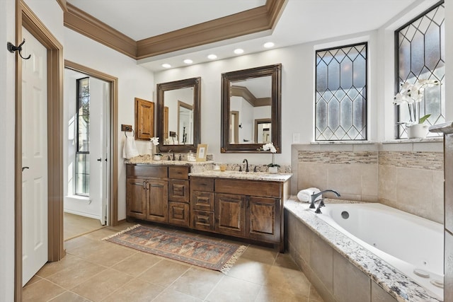 full bathroom with tile patterned flooring, crown molding, double vanity, a wealth of natural light, and a tub with jets