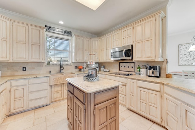 kitchen featuring stainless steel microwave, tasteful backsplash, a center island, and black electric cooktop