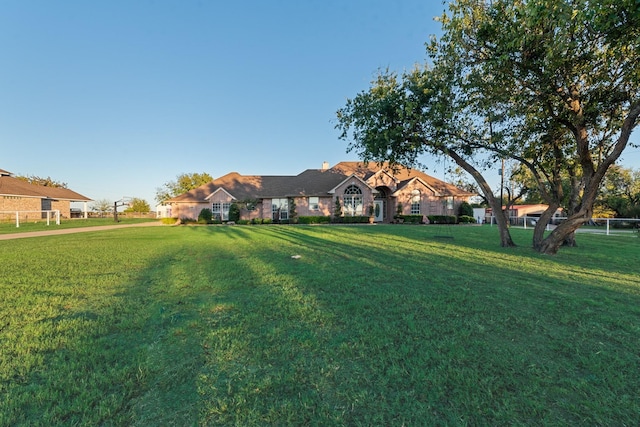 view of front of house with a front lawn