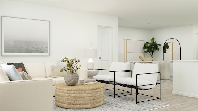 living room with baseboards and light wood-style floors