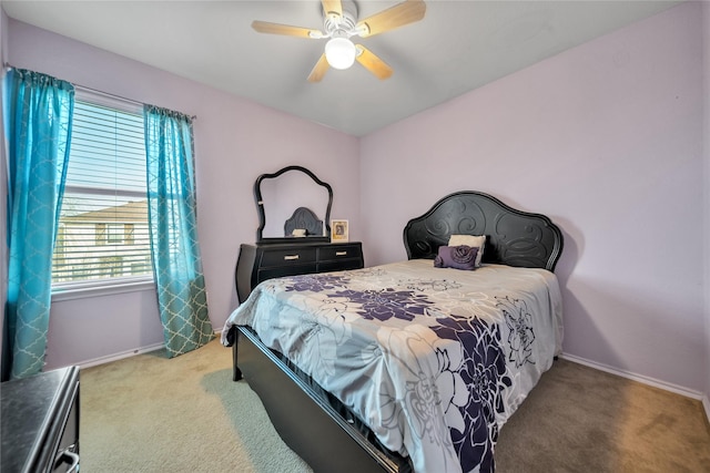 4011 Ridgetop Dr, Heartland, TX 75126 - carpeted bedroom with baseboards and ceiling fan