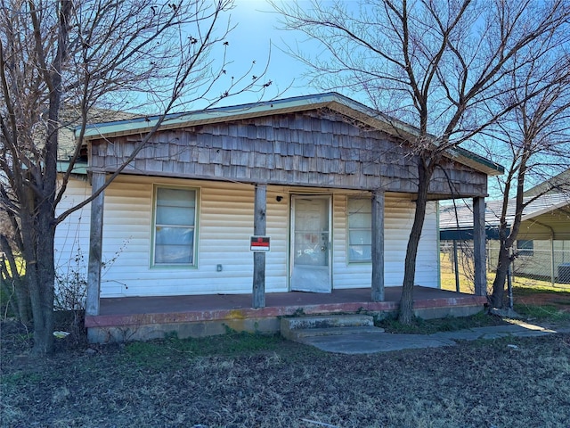 view of front of property featuring covered porch