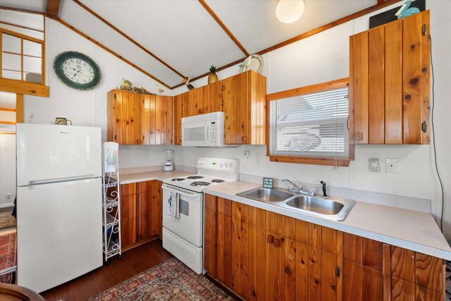 2092 Pelican Isle Dr, Kerens, TX 75144 - kitchen featuring white appliances, a sink, dark wood-style floors, light countertops, and vaulted ceiling
