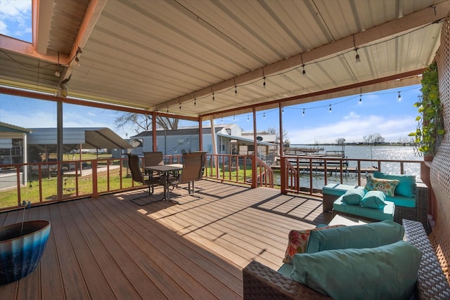 wooden terrace with a water view