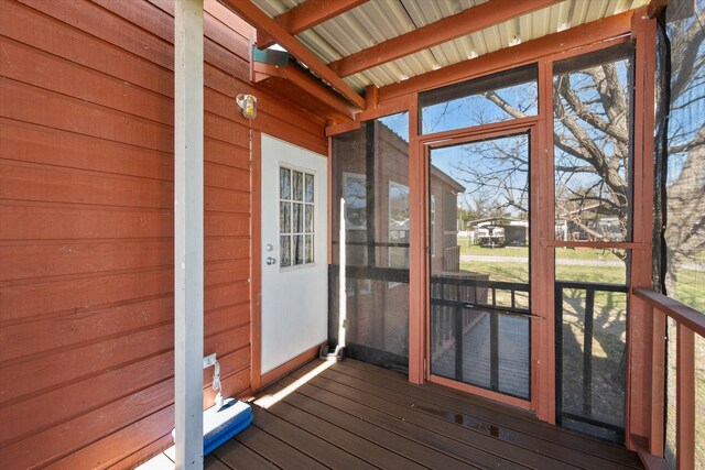 2092 Pelican Isle Dr, Kerens, TX 75144 - unfurnished sunroom featuring healthy amount of natural light and beam ceiling