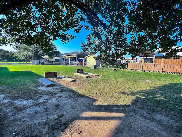 view of yard featuring fence