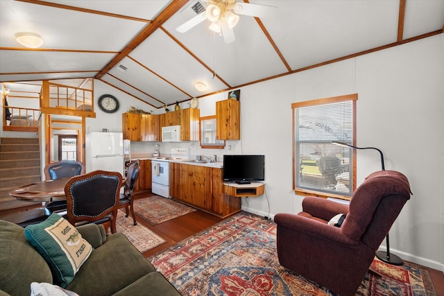 living area featuring stairs, lofted ceiling with beams, wood finished floors, and baseboards