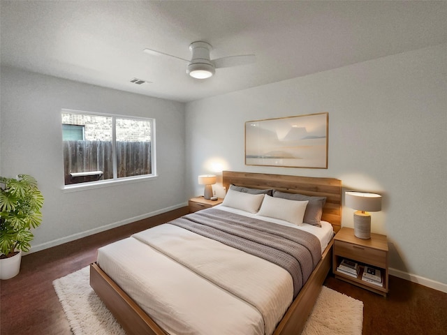 bedroom with visible vents, ceiling fan, and baseboards