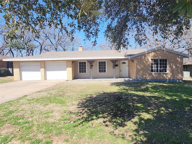 single story home featuring a front lawn, concrete driveway, an attached garage, brick siding, and a chimney