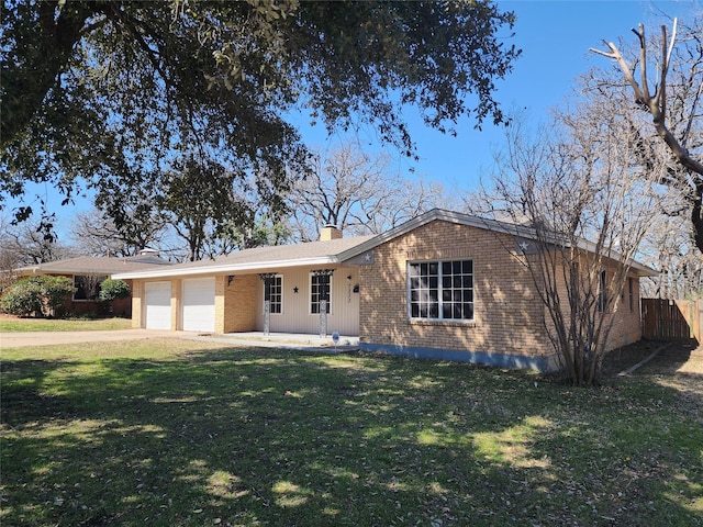 single story home featuring a front lawn, concrete driveway, brick siding, and a chimney