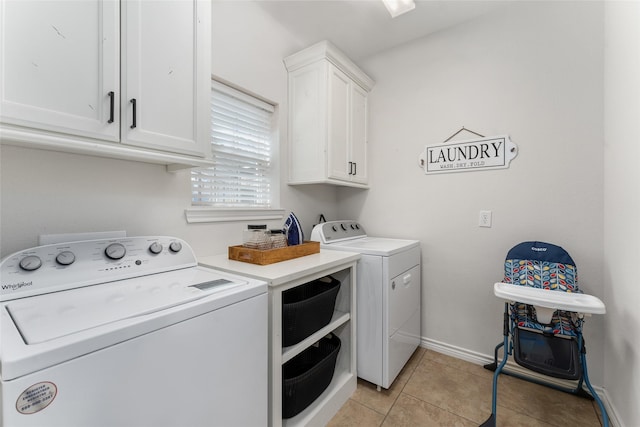 156 Palisade Dr, Gun Barrel City, TX 75156 - laundry room featuring washing machine and dryer, light tile patterned floors, cabinet space, and baseboards