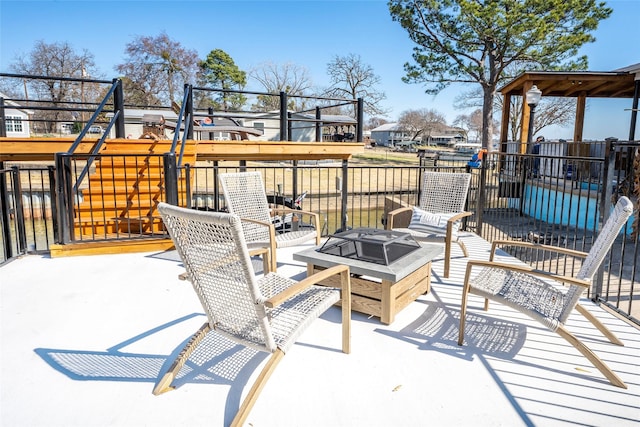156 Palisade Dr, Gun Barrel City, TX 75156 - view of patio / terrace with a fire pit