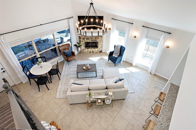 156 Palisade Dr, Gun Barrel City, TX 75156 - living room with baseboards, a chandelier, vaulted ceiling, a fireplace, and tile patterned floors