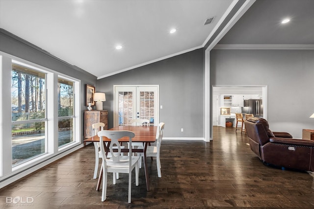 dining area featuring dark wood finished floors, french doors, visible vents, and ornamental molding