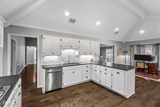 kitchen featuring visible vents, a sink, dark countertops, a peninsula, and dishwasher