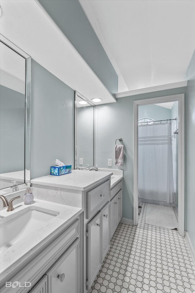 bathroom with a shower with curtain and vanity