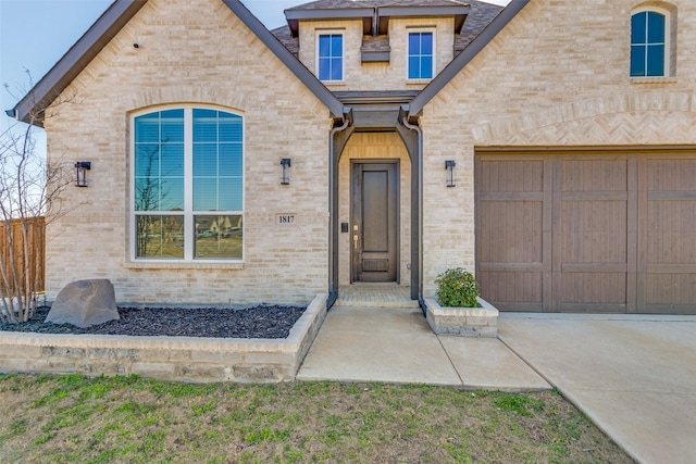 entrance to property with brick siding