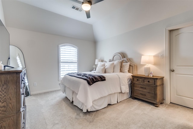 bedroom featuring a ceiling fan, baseboards, visible vents, vaulted ceiling, and light carpet