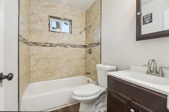 bathroom with toilet, vanity, bathing tub / shower combination, and wood finished floors