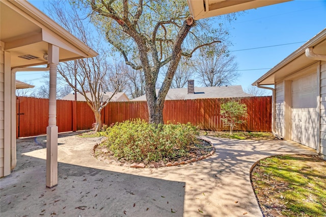 view of yard featuring a patio and fence private yard