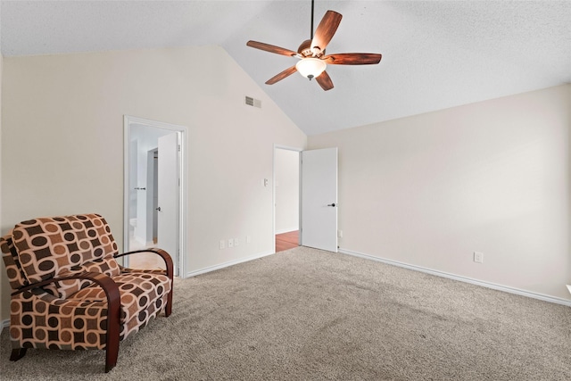 unfurnished room featuring baseboards, visible vents, carpet floors, and high vaulted ceiling