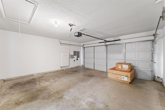 garage featuring electric panel and a garage door opener