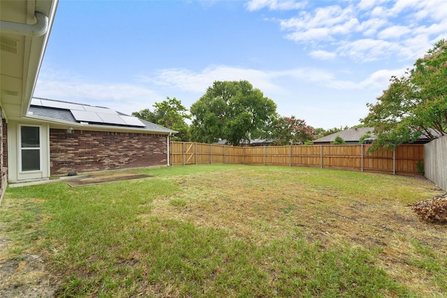 view of yard featuring a fenced backyard