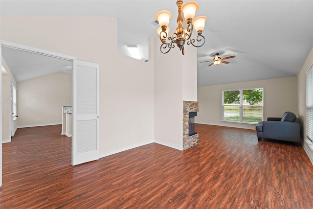 unfurnished living room with baseboards, wood finished floors, a fireplace, and vaulted ceiling