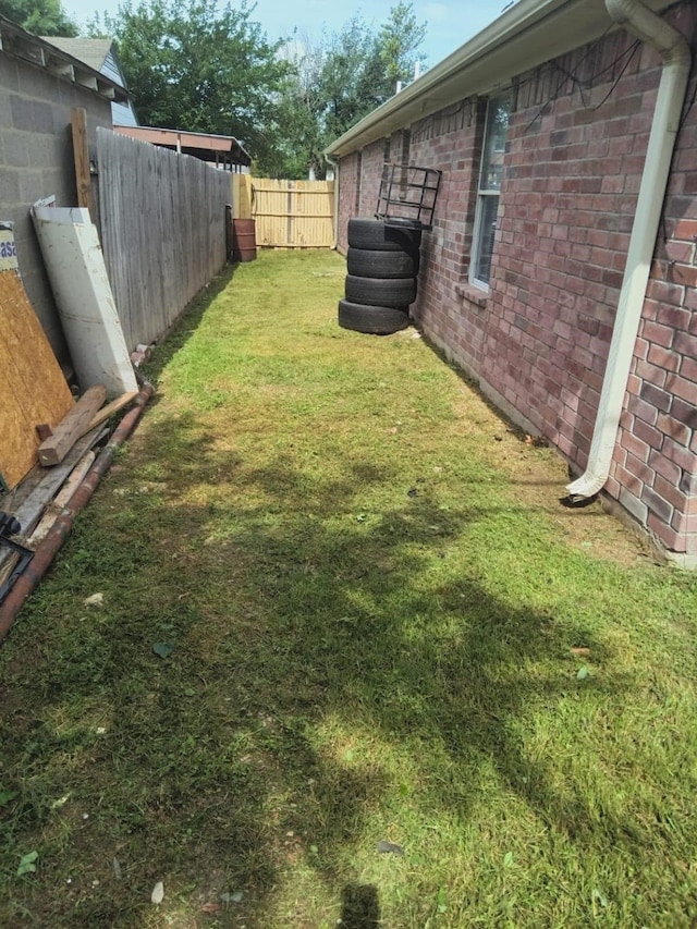 view of yard featuring a fenced backyard