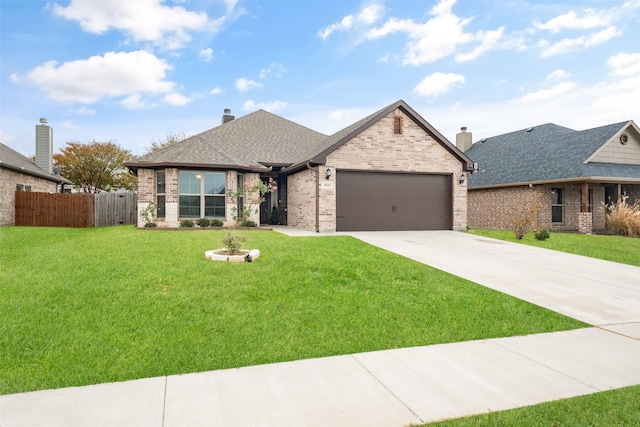 view of front of home with fence, an attached garage, a chimney, concrete driveway, and brick siding