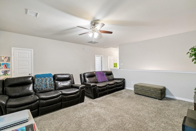 carpeted cinema featuring visible vents, ceiling fan, and baseboards