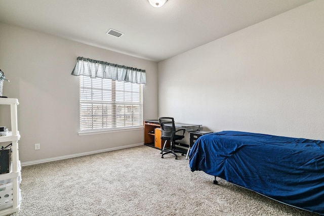 bedroom with visible vents, baseboards, and carpet floors