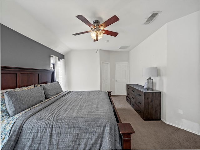 bedroom with visible vents, baseboards, lofted ceiling, a ceiling fan, and dark colored carpet