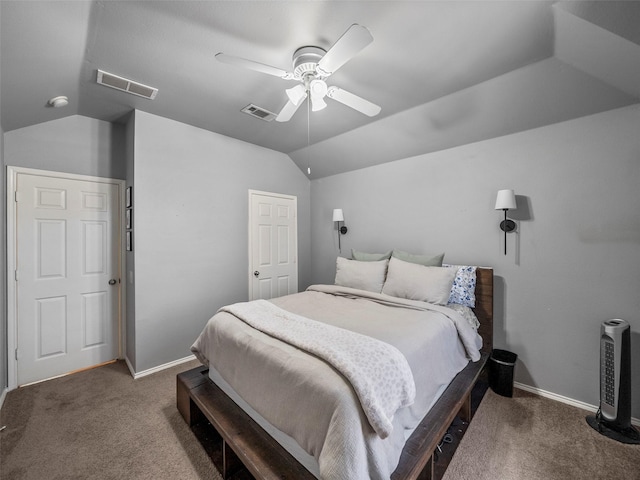 carpeted bedroom with vaulted ceiling, baseboards, and a ceiling fan