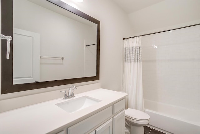 bathroom featuring tile patterned flooring, toilet, vanity, and shower / bath combination with curtain