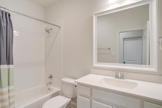 full bathroom with vanity, shower / bath combination with curtain, and toilet