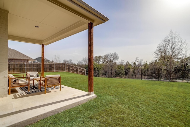 view of yard with a fenced backyard, outdoor lounge area, and a patio